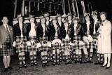 Jean Carnie's Leith Ladies Pipe Band and coach