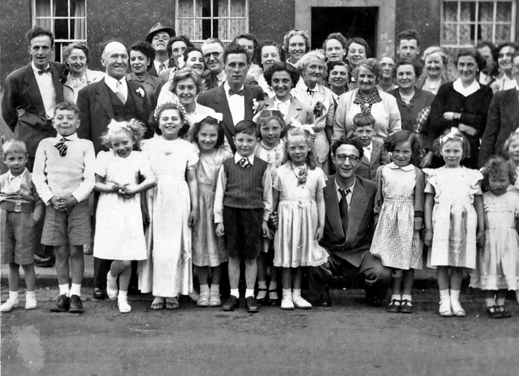 A group of neighbours and family in Niddrie Mains Terrace for the wedding of Bobby Quilietti and Jeanette Henderson