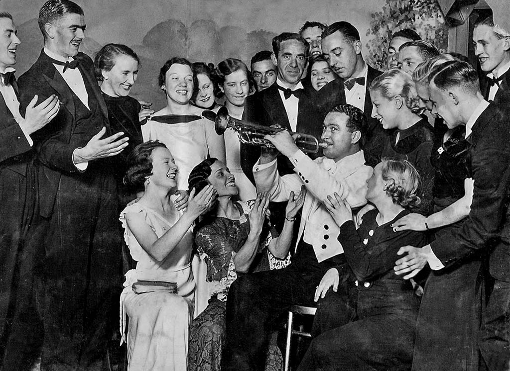 Tom Bollen at the Palais de Danse, Edinburgh, surrounded by a group of 20 Dancers, 1935