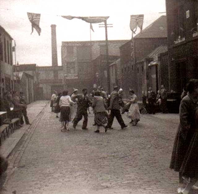 Street Entertainment to mark the coronation of Queen Elizabeth II, 1953  -  'The Pied Piper'