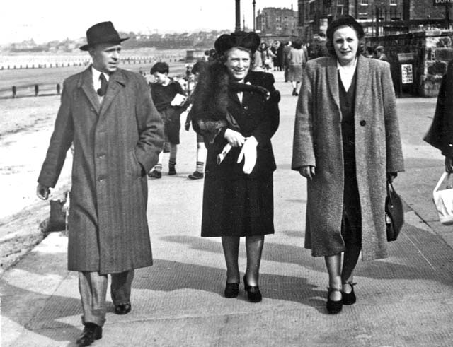Great Aunt Aggie walks along Portobello Promenade in her fur coat with sister Cissie and brother-in-law, Jackin the early-1950s