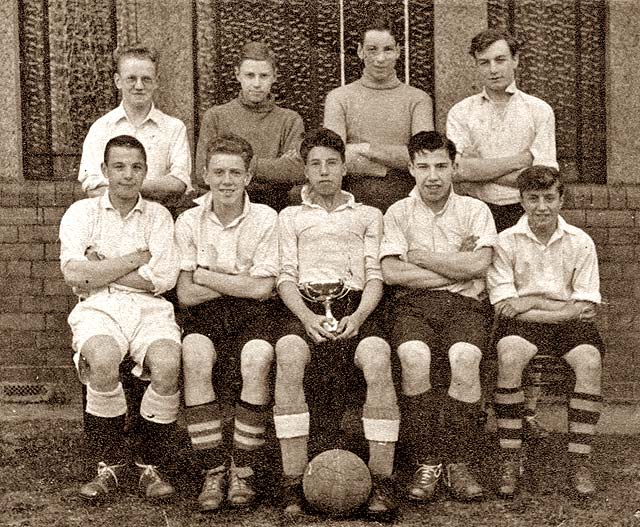Saughtonhall Boys' Club Football Team, attached toi Saughtonhall Congregational Church.  This team won the Lothian Amateur Forsyth Cup (under 16) in 1944-45.