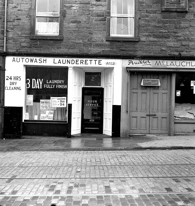 Shop advertising Snow White Laundry  -  Photo possibly taken around 1952