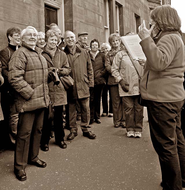 Standard Life Strollers pause to listen to their guide Karen MacCormick on a walk around Canonmills and Silvermills - February 2011