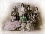 A theatrical group, including Helen Henderson in green.  What was the show?