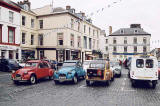 Citroen 2CVs in the centre of Kelso in the Scottish Borders  -  during the World 2CV Meeting held at Kelso, July 2005