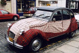 Citroen 2CV in the centre of Kelso in the Scottish Borders  -  during the World 2CV Meeting held at Kelso, July 2005