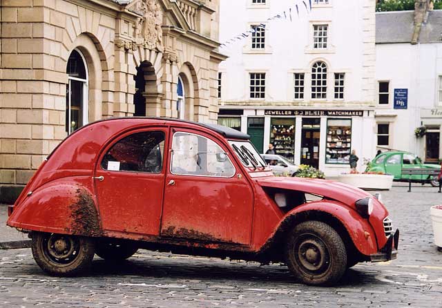 Citroen 2CVs in the centre of Kelso in the Scottish Borders  -  during the World 2CV Meeting held at Kelso, July 2005