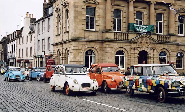 Citroen 2CVs in the centre of Kelso in the Scottish Borders  -  during the World 2CV Meeting held at Kelso, July 2005