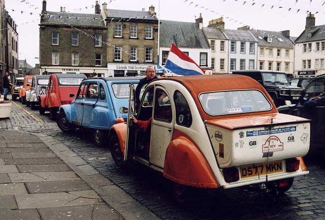 Citroen 2CVs in the centre of Kelso in the Scottish Borders  -  during the World 2CV Meeting held at Kelso, July 2005