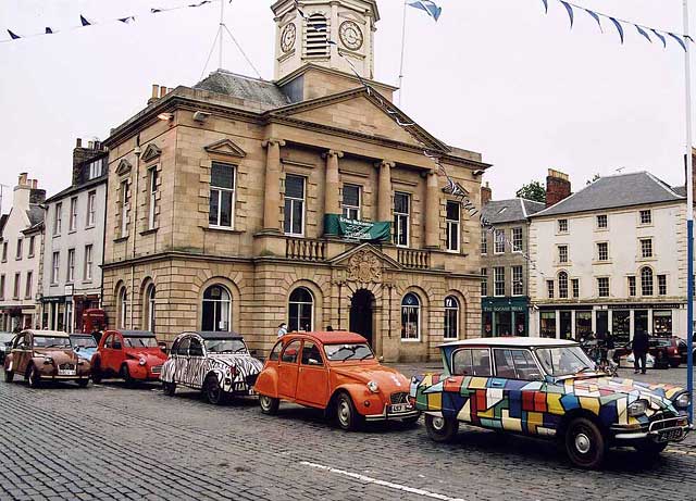 Citroen 2CVs in the centre of Kelso in the Scottish Borders  -  during the World 2CV Meeting held at Kelso, July 2005