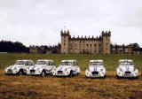 Citroen 2CVs in the grounds of Floors Castle, Kelso in the Scottish Borders  -  during the World 2CV Meeting held at Kelso, July 2005