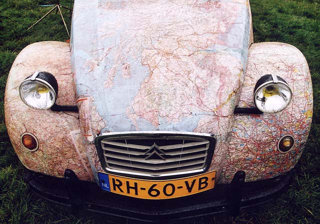 A Citroen 2CV in the grounds of Floors Castle,  Kelso, in the Scottish Borders  -  during the World 2CV Meeting held at Kelso, July 2005