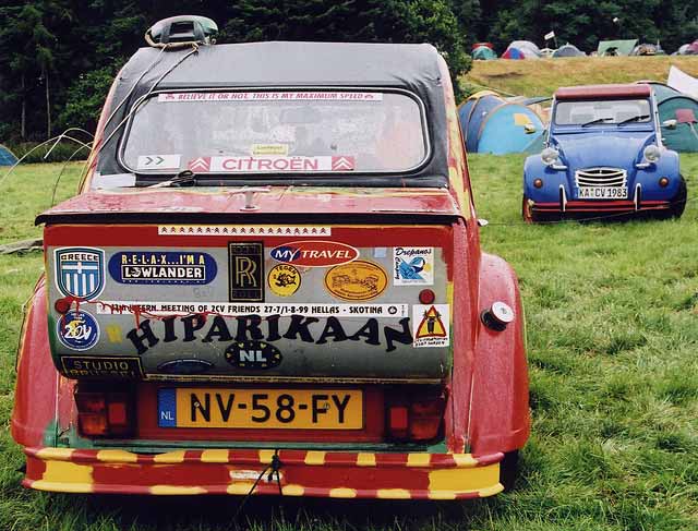 Citroen 2CV cars in the grounds of Floors Castle,  Kelso, in the Scottish Borders  -  during the World 2CV Meeting held at Kelso, July 2005