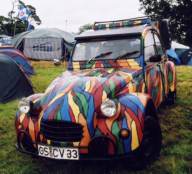 A Citroen 2CV in the grounds of Floors Castle,  Kelso, in the Scottish Borders  -  during the World 2CV Meeting held at Kelso, July 2005