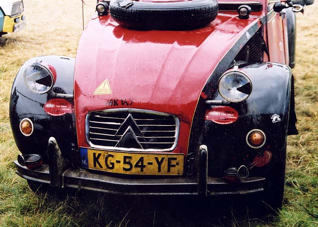 A Citroen 2CV in the grounds of Floors Castle,  Kelso, in the Scottish Borders  -  during the World 2CV Meeting held at Kelso, July 2005