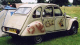 Citroen 2CV in the grounds of Floors Castle, Kelso in the Scottish Borders  -  during the World 2CV Meeting held at Kelso, July 2005