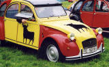 Citroen 2CVs in the grounds of Floors Castle, Kelso in the Scottish Borders  -  during the World 2CV Meeting held at Kelso, July 2005