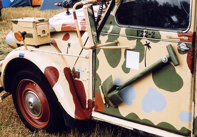 A Citroen 2CV in the grounds of Floors Castle,  Kelso, in the Scottish Borders  -  during the World 2CV Meeting held at Kelso, July 2005