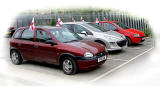 Cars with flags in support of the English Team, parked near the centre of Bradford in during the Football World Cup, being held in South Africa, June 2010