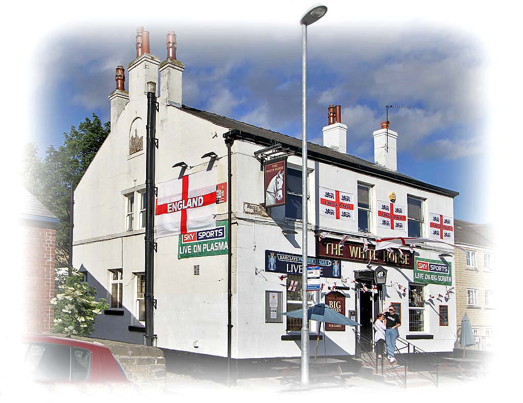Pudsey, Leeds  -  The White Horse, decorated in support of the English team in the Football World Cup being held in South Africa, June 2010