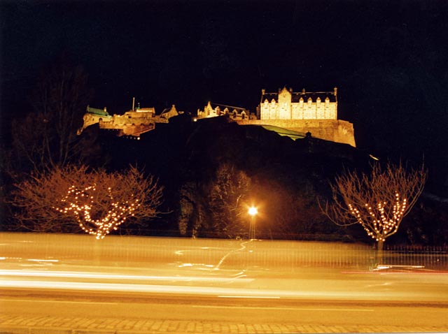 Edinburgh Castle and Christmas Lights on the trees in West Princes Street Gardens