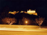 Edinburgh Castle and Christmas Lights on the trees in Princes Street Gardens