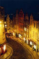 Looking down on the West Bow with shops on the south side of the Grassmarket and George Heriot's School in the background