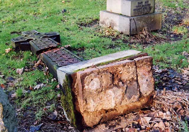 Photograph by Peter Stubbs  -  Edinburgh  -  January 2003  -  Warriston Cemetery tombstone toppled 4