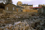 Christmas Tree Warehouse at Canonmills  -  March 1996, with the signs still on display from December 1995  -  Entrance still standing but building behind demolished