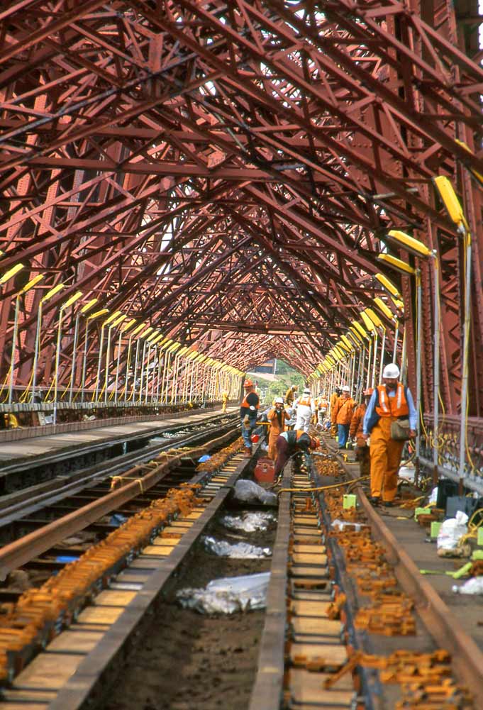 Laying new railway track across the Forth Bridge