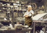 Alexander McLennan with his hammer, in the middle of his blacksmiths workshop at Powderhal