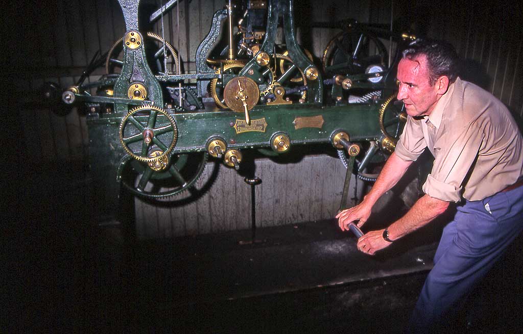 The clockwinder, winding the clock at St Giles Church  -  1992