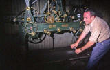 The clockwinder, winding the clock at St Giles Church  -  1992