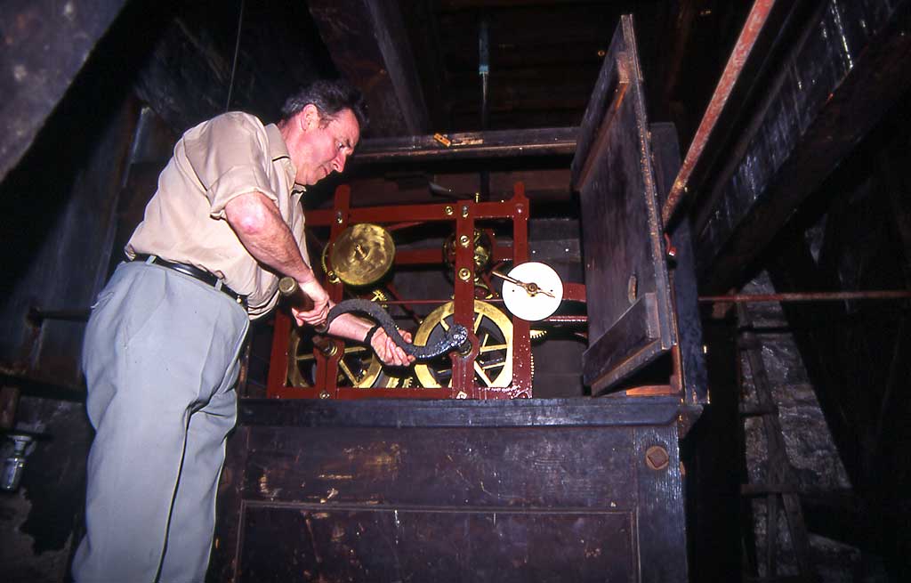 The clockwinder, winding the clock at St Stephens Church  -  1993