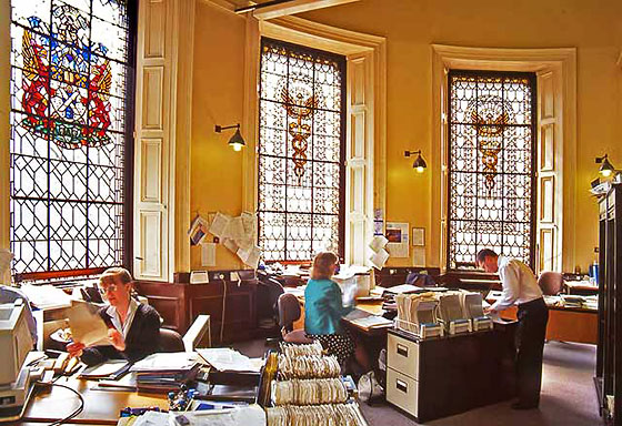 Royal Bank of Scotland worksrs behind the counter at their bank, 14 George Street