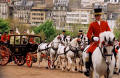 Photograph by Peter Stubbs  -  Edinburgh  -  May 2002  -  The Queen's Coach driving up the Royal Mile en route from Assembly Hall to Holyrood