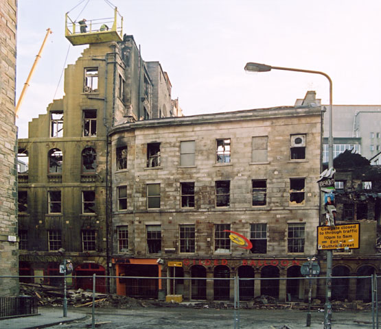 Photographs by Peter Stubbs  -  Edinburgh  -  December 2002  -  Fire in the Old Town of Edinburgh  -  Dismantling the wall in the Cowgate