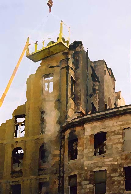 Photograph by Peter Stubbs  -  Edinburgh  -  December 2002  -   Fire in the Old Town of Edinburgh  -  Dismantiling of the wall in the Cowgate (close-up)