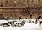 Looking across Sherbrooke Street from Standard Life 's Canadian Head Office to the Ritz Hotel.  The tables are outside Standard Life's building