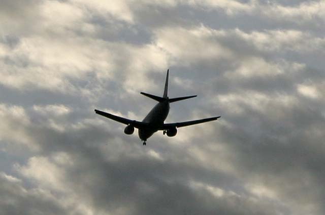 Sky over Silverknowes, Edinburgh  -  with plane approaching Edinburgh Airport