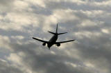 Sky over Silverknowes, Edinburgh  -  Zoom-in to a plane approaching Edinburgh Airport