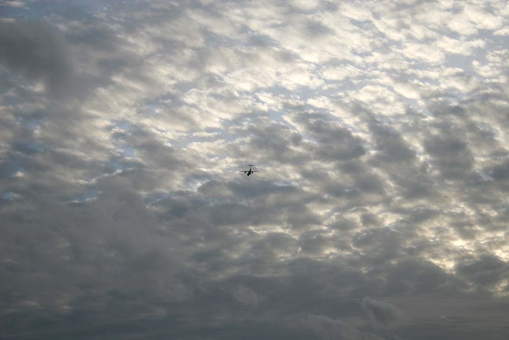 Sky over Silverknowes, Edinburgh  -  with plane approaching Edinburgh Airport