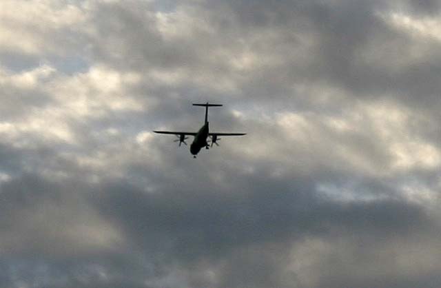 Sky over Silverknowes, Edinburgh  - Zoom-in to a plane approaching Edinburgh Airport