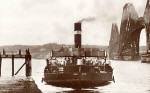 The Forth Rail Bridge and the ferry boat, Dundee, on the Queensferry Passage at South Queensferry