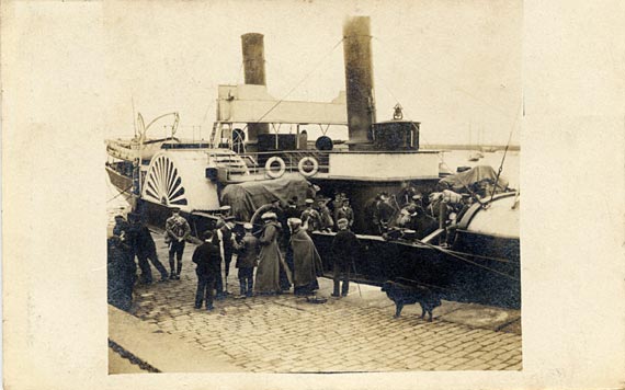 Post card of horses being loaded at Granton Harbour for manoueuvres 