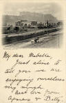 Postcard by an unidentified publisher  -    Looking to the south-west, across Princes Street towards the National Galleries and Edinburgh Castle on Castle Hill