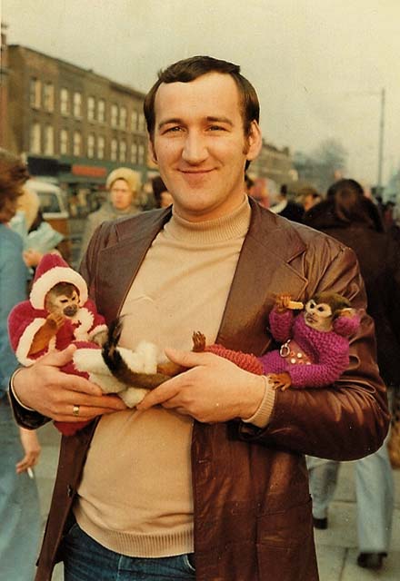 Eric Gold at Bethnalll Green Market, London with his two monkeys, 1966