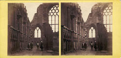 Stereo View by McGlashon  -  Looking towards the East Window of Holyrood Abbey, with figures in the scene