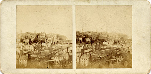 Stereo view by McGlashon  -   looking from the Burns' Monument in Regent Road, over the railway line at Waverley towards Edinburgh Castle.